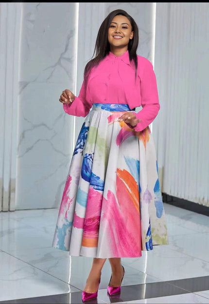 Hot-Pink Bluse und Midi-Rock mit farbigem Kunstprint im Fleckenmuster