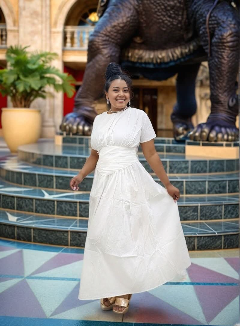 White pleated maxi dress with ruched stretch waist and short sleeves