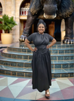 Black pleated maxi dress with gathered stretch waist, short sleeves
