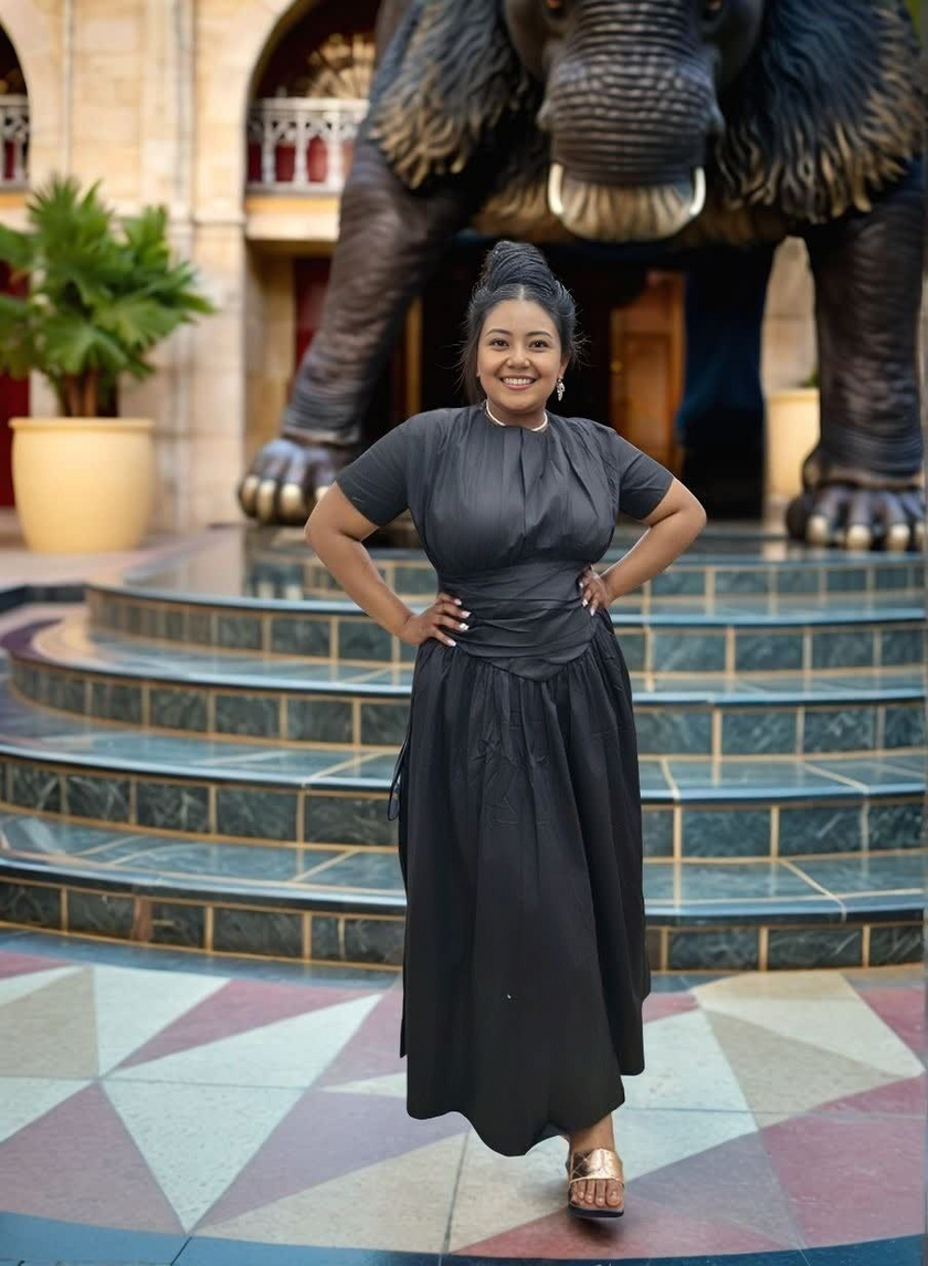 Black pleated maxi dress with gathered stretch waist, short sleeves