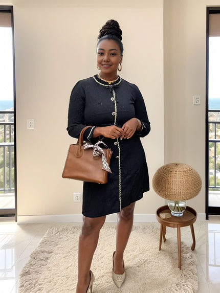 Flap-collar pearl button dress in dark navy with long sleeves, button front; tan bag