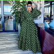 Plus size polka dot maxi dress, dark green with white spots, puff sleeves and tiered skirt