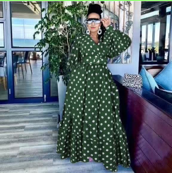 Plus size polka dot maxi dress, dark green with white spots, puff sleeves and tiered skirt