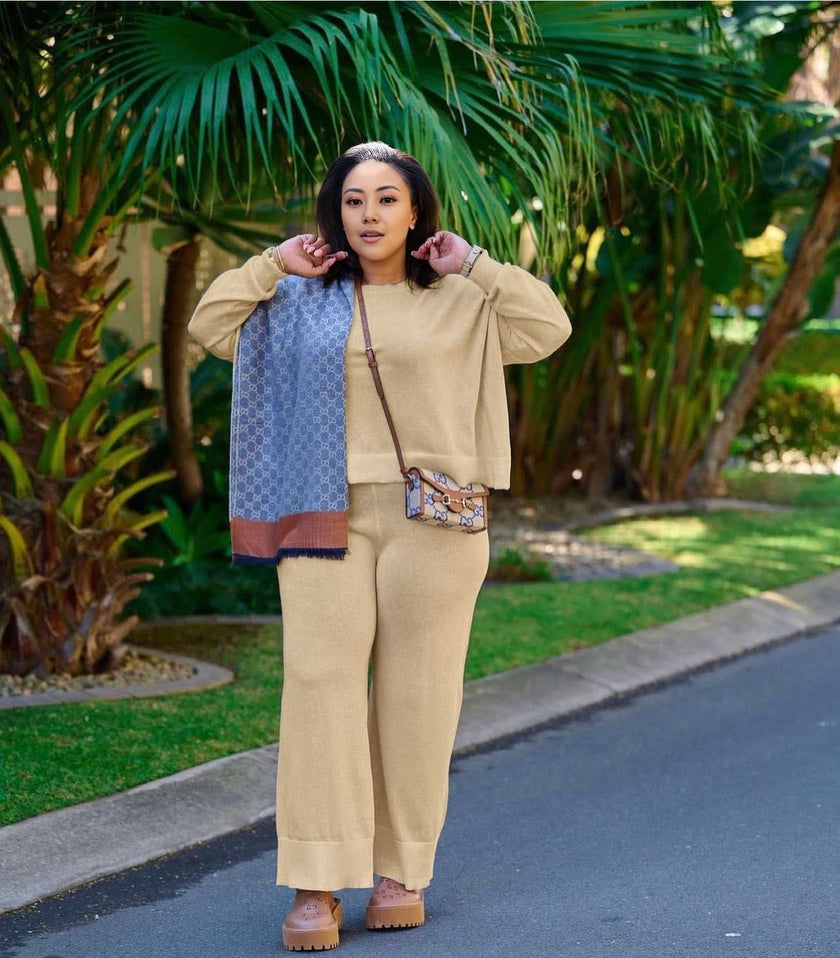 Tan knit two-piece set with wide-leg loose pants and zip-front top