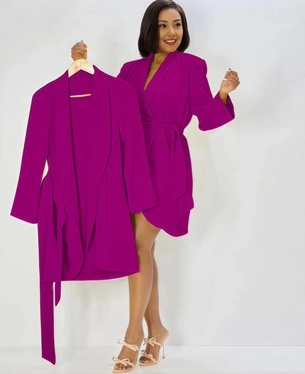 Magenta wrap mini dress with long sleeves, V-neck, and tied waist bow detail.