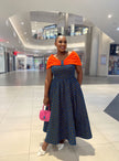 Blue orange print off shoulder traditional midi dress for women modelled in a shopping mall