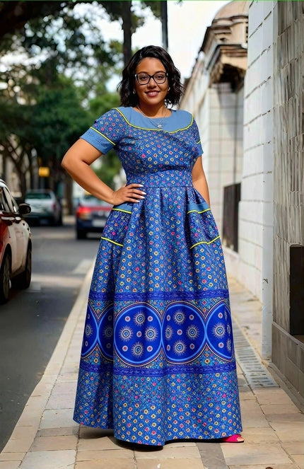 Blue printed maxi dress with short sleeves, square neckline and waist tie
