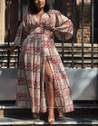 Printed maxi dress with long puff sleeves and high slit skirt, V-neck