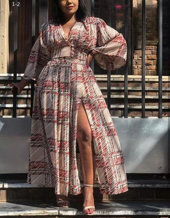 Printed maxi dress with long puff sleeves and high slit skirt, V-neck