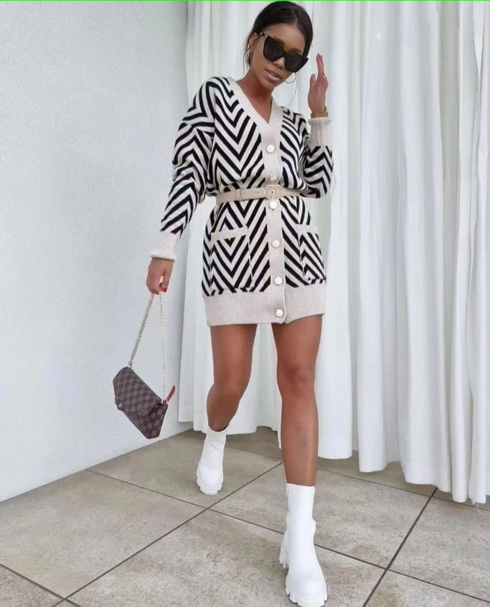 Geometric knit cardigan in light base with black chevron pattern and button front
