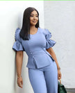 Sky-blue puff-sleeve top with matching wide-leg trousers twin set