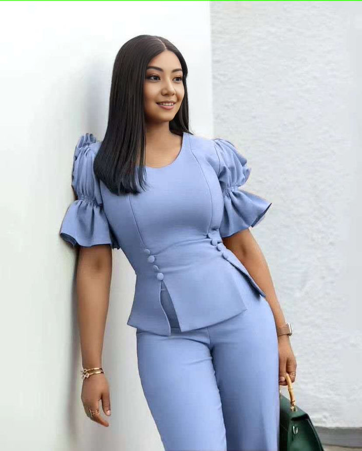 Sky-blue puff-sleeve top with matching wide-leg trousers twin set
