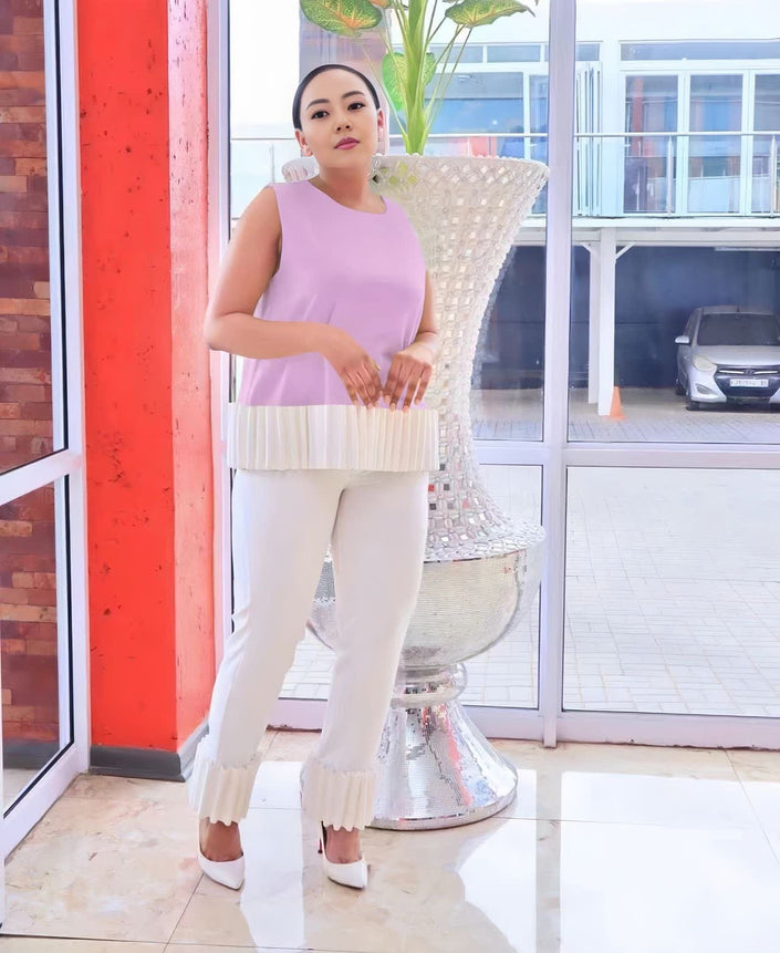 Cream fringe-hem pants with straight leg, ankle length