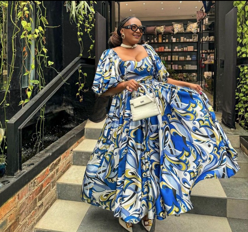 Off-shoulder midi dress with blue and white abstract swirl print