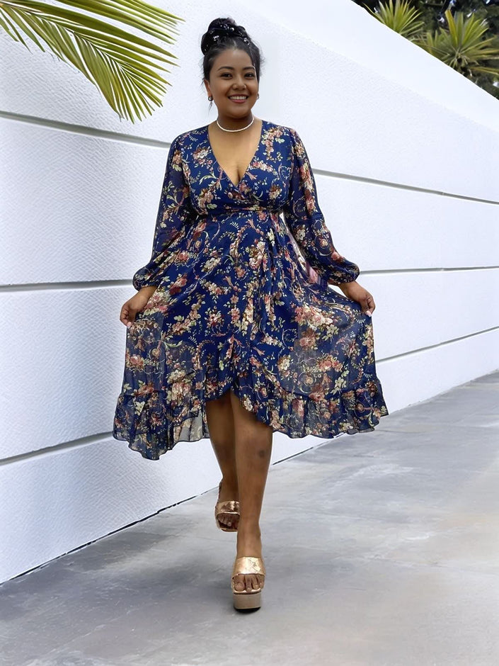 Floral midi dress with V-neck and puff sleeves, navy blue with multicolor pattern