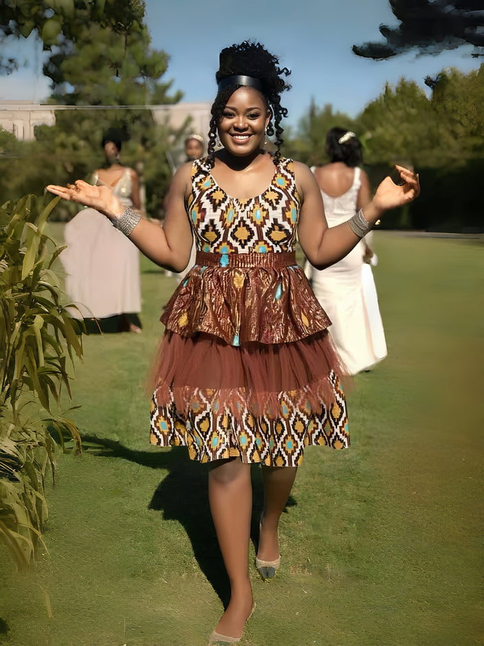Women’s tiered A-line dress with patterned bodice and layered skirt, sleeveless