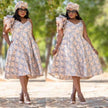 Floral A-line dress with ruffle puff sleeves, light blue with pastel flower print