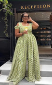 Yellow-green wide-leg jumpsuit with geometric print, square neckline and puff sleeves