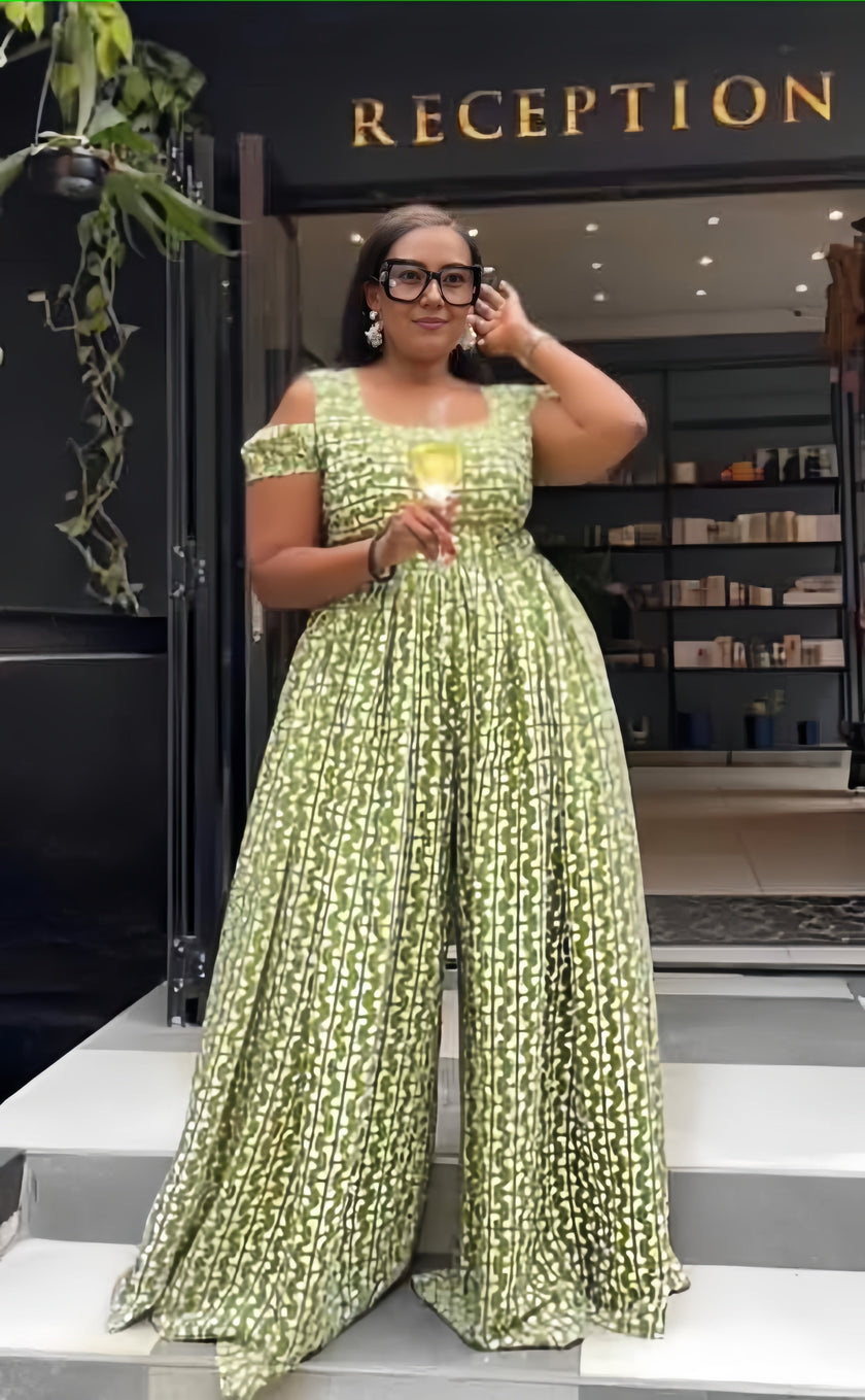 Yellow-green wide-leg jumpsuit with geometric print, square neckline and puff sleeves