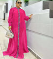 Deep-pink maxi dress with long sleeves and floral placket trim