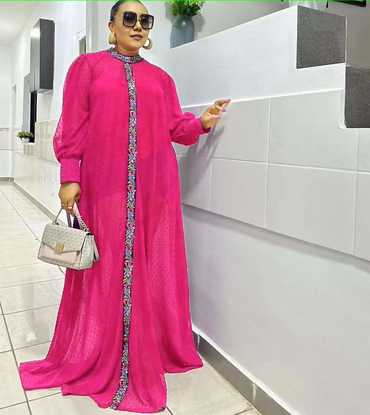 Deep-pink maxi dress with long sleeves and floral placket trim