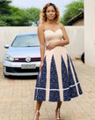Strapless midi dress with patchwork bodice and blue-and-white flared skirt