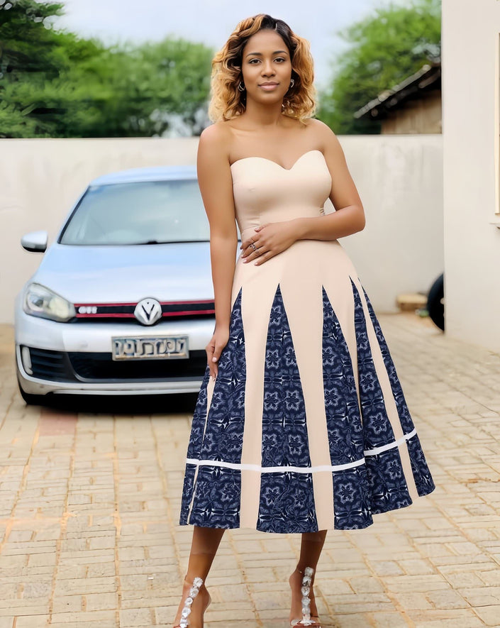 Strapless midi dress with patchwork bodice and blue-and-white flared skirt