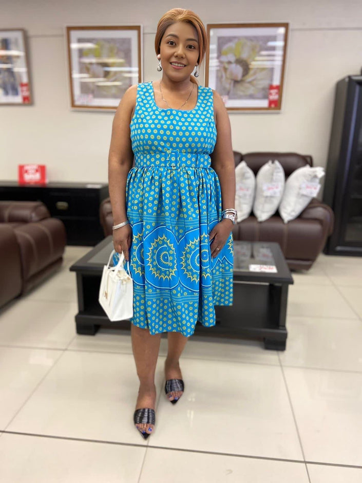Blue midi dress with patterned hem and gathered skirt, square neckline