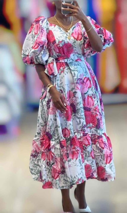 Floral midi dress with puff sleeves and waist belt, pink and blue print