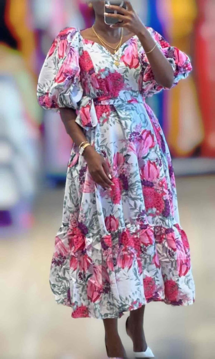 Floral midi dress with puff sleeves and waist belt, pink and blue print