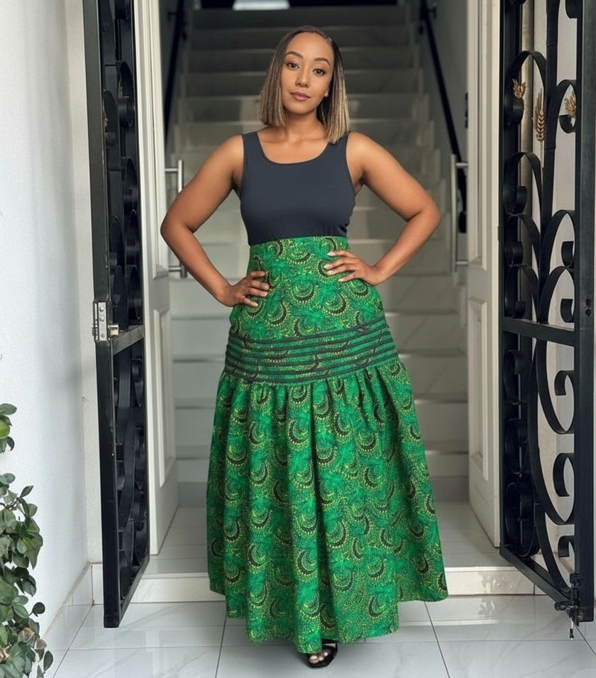 High-waist African print maxi skirt in green, gathered waistband, tiered flare