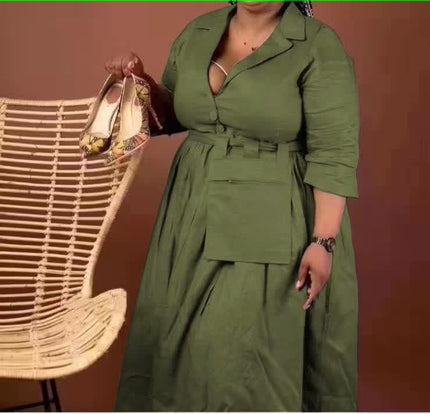 knee-length dress with a collar, waist belt, button details, and pockets