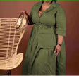 Dark-green belted midi dress with pointed collar, V-neck, and three-quarter sleeves