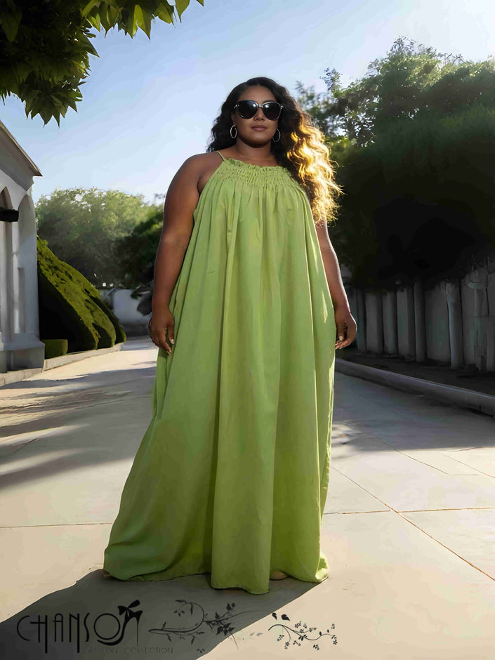 Yellow-green sleeveless maxi dress with gathered neckline and full skirt
