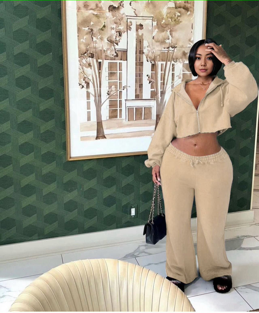 Nude zip-front hoodie and loose jogger set with drawstring waist and hood