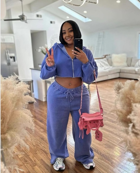 Sky-blue zip hoodie jacket and matching loose jogger pants, cropped waist