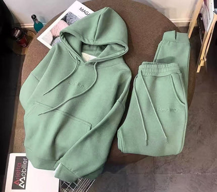 Mint green hoodie and sweatpants set, front view with drawstring hood