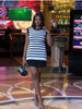 Black-and-white striped sleeveless knit dress mini with ruffle hem and sleeveless round neck