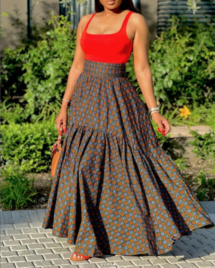Twin set maxi skirt: red sleeveless top and dark navy floral print skirt