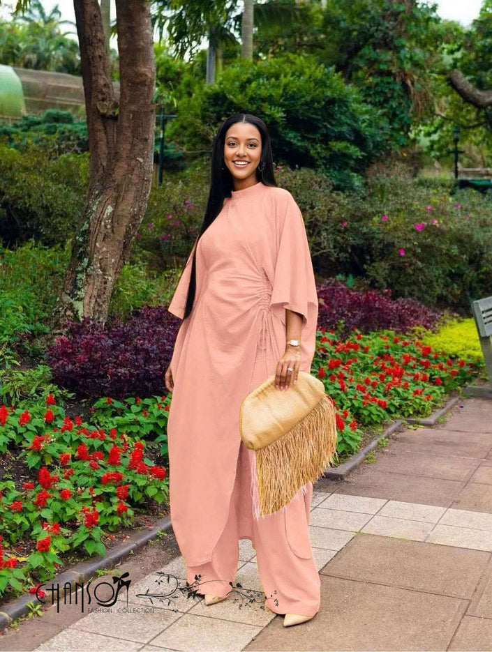 Gathered wide-leg pantsuit in pink with draped side tie and wide sleeves