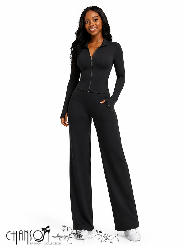 Black zip-front fitted cropped tracksuit set with wide-leg pants.