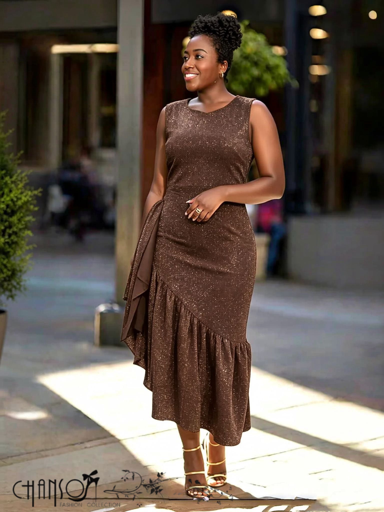 Brown glitter sleeveless asymmetrical midi dress with draped sleeve detail and tiered skirt