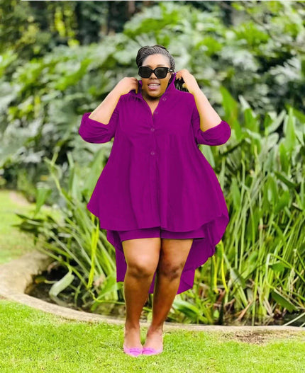 Purple high-low tunic with buttons and matching shorts, draped uneven hem