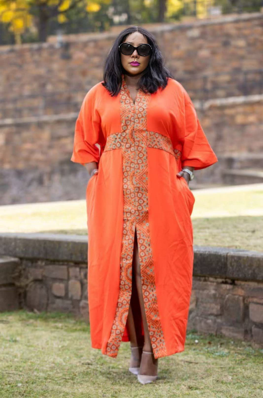 Orange maxi slit dress with beige tribal panel V-neck and front slit