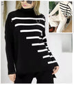 Two-piece striped knit pullover and trousers set, black with white stripes, high neck, long sleeves