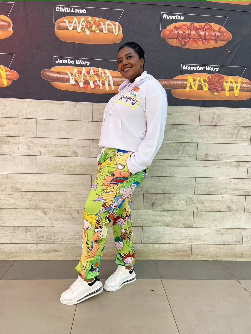 Cartoon hoodie and pants twin set, white hooded sweatshirt with logo; bright green cartoon joggers