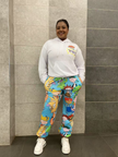 Cartoon hoodie and pants twin set, white hooded sweatshirt with logo; blue-green cartoon print joggers