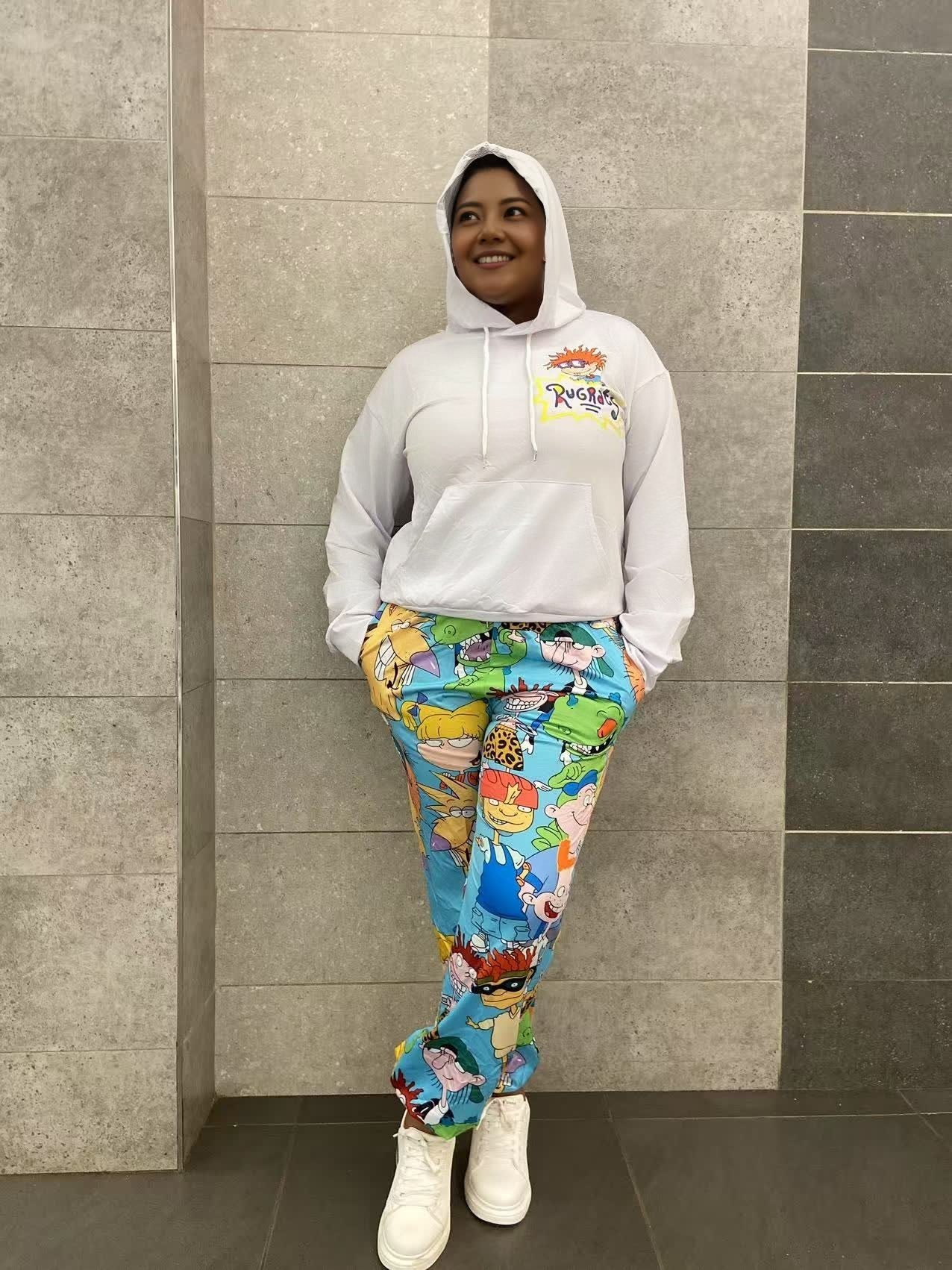 Cartoon hoodie and pants twin set, white hooded hoodie with chest logo; colorful cartoon print joggers