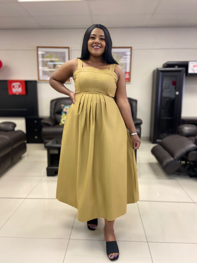 Mustard yellow pleated sleeveless midi dress with high waist seam and flared hem