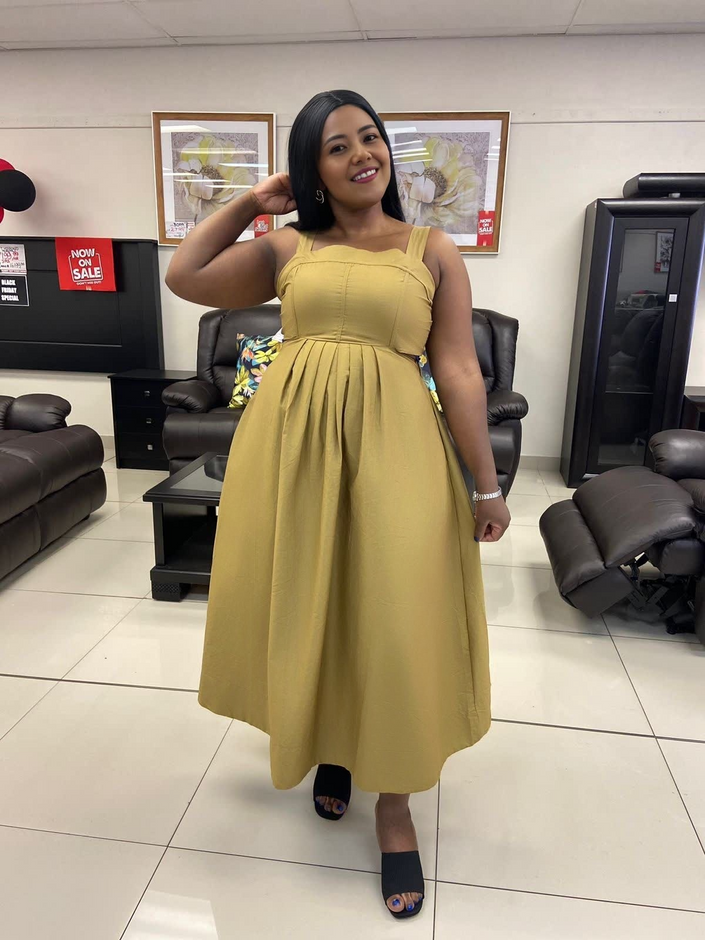 Mustard yellow pleated sleeveless midi dress with high waist seam and flared skirt